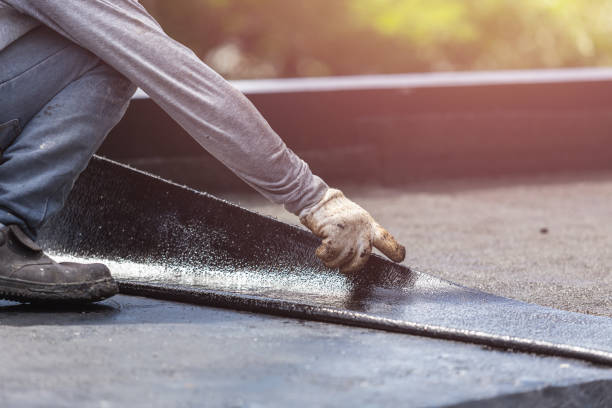 Professional Basement Waterproofing technician working in Waterloo, IL